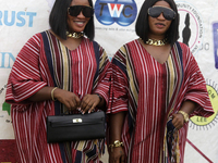 L-R: Taiwo Adeleke and Kehinde Adeleke, female twins, pose for a photograph during the 2024 edition of the annual World Twins Festival in Ig...