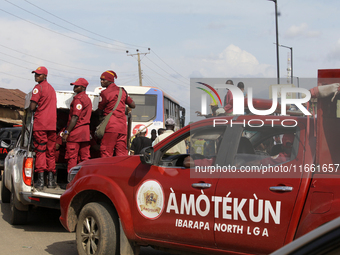 Members of Amotekun, a regional security group, participate in the 2024 edition of the annual World Twins Festival in Igbo-Ora, the Land of...