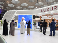 Visitors attend the Cityscape Qatar 2024 real estate exhibition at the Doha Exhibition and Convention Center in Doha, Qatar, on October 13,...