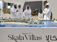 Visitors gather at the Skala Villas Real Estate pavilion at the Cityscape Qatar 2024 real estate exhibition at the Doha Exhibition and Conve...