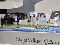 Visitors gather at the Skala Villas Real Estate pavilion at the Cityscape Qatar 2024 real estate exhibition at the Doha Exhibition and Conve...