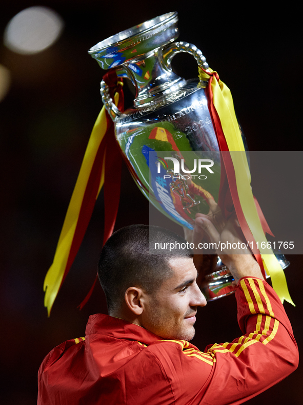 Alvaro Morata of Spain shows the UEFA EURO trophy to the crowd prior to the UEFA Nations League 2024/25 League A Group A4 game between Spain...