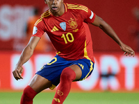 Lamine Yamal of Spain is in action during the UEFA Nations League 2024/25 League A Group A4 game between Spain and Denmark at Enrique Roca S...