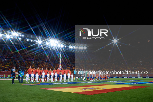 Spain and Denmark line up during the national anthems before the UEFA Nations League 2024/25 League A Group A4 game between Spain and Denmar...