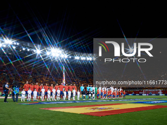 Spain and Denmark line up during the national anthems before the UEFA Nations League 2024/25 League A Group A4 game between Spain and Denmar...