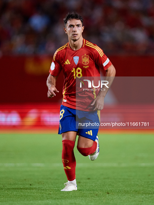 Martin Zubimendi of Spain runs during the UEFA Nations League 2024/25 League A Group A4 game between Spain and Denmark at Enrique Roca Stadi...