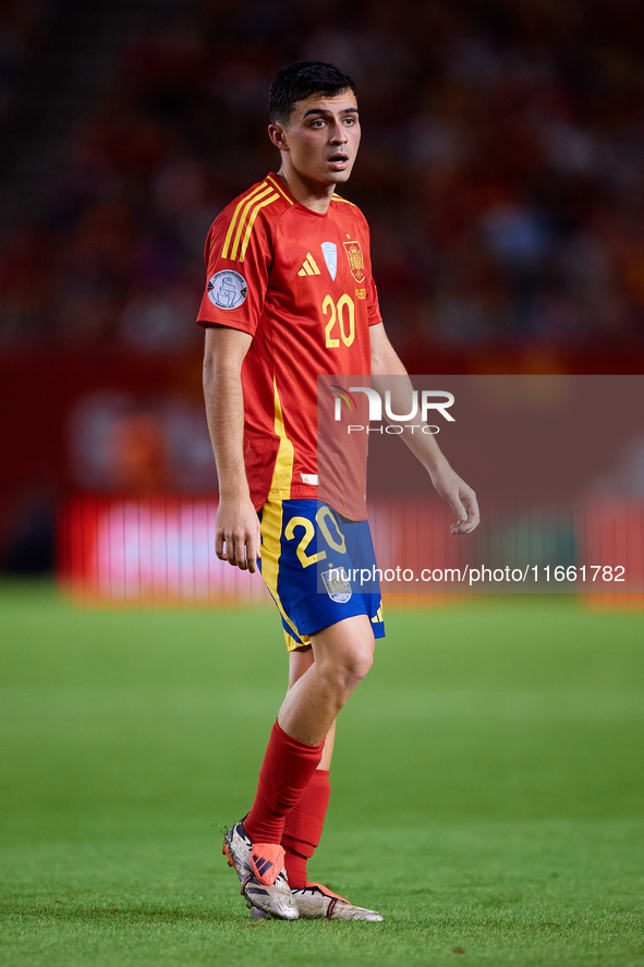 Pedri of Spain looks on during the UEFA Nations League 2024/25 League A Group A4 game between Spain and Denmark at Enrique Roca Stadium in M...