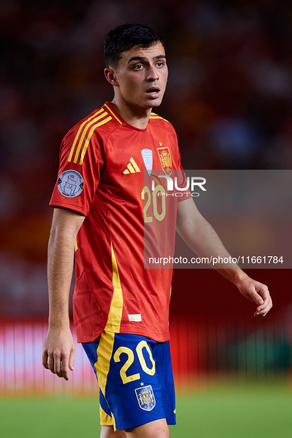 Pedri of Spain looks on during the UEFA Nations League 2024/25 League A Group A4 game between Spain and Denmark at Enrique Roca Stadium in M...