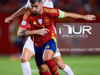 Alvaro Morata of Spain (R) competes for the ball with Hjulmand of Denmark during the UEFA Nations League 2024/25 League A Group A4 game betw...