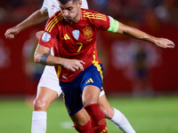 Alvaro Morata of Spain (R) competes for the ball with Hjulmand of Denmark during the UEFA Nations League 2024/25 League A Group A4 game betw...