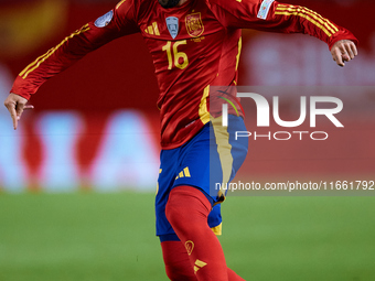 Alex Baena of Spain is in action during the UEFA Nations League 2024/25 League A Group A4 game between Spain and Denmark at Enrique Roca Sta...