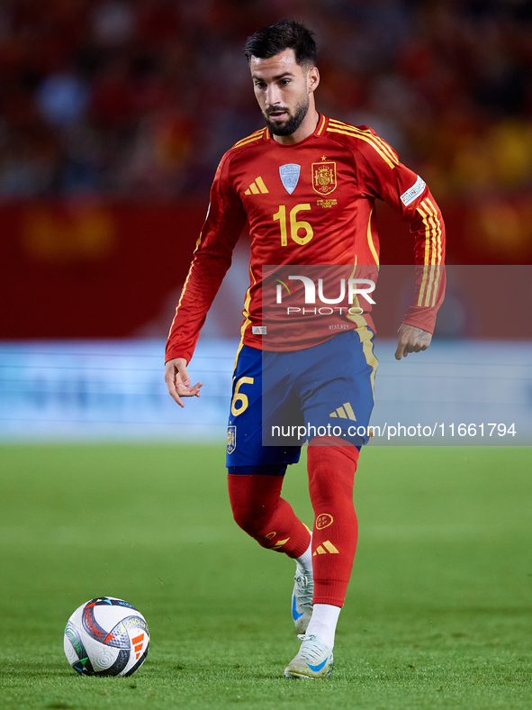 Alex Baena of Spain is in action during the UEFA Nations League 2024/25 League A Group A4 game between Spain and Denmark at Enrique Roca Sta...