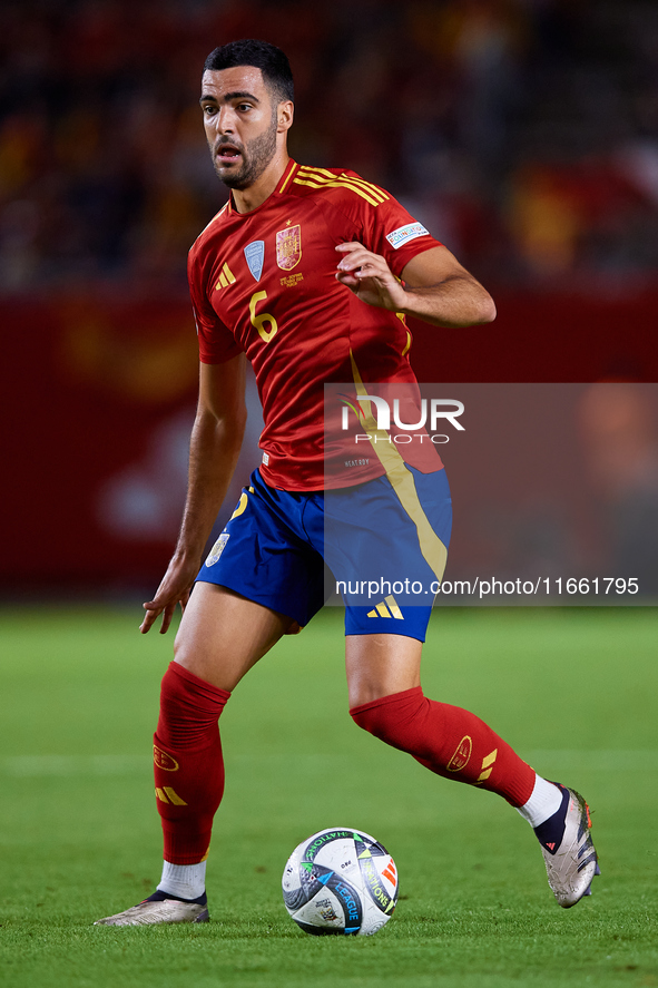 Mikel Merino of Spain is in action during the UEFA Nations League 2024/25 League A Group A4 game between Spain and Denmark at Enrique Roca S...