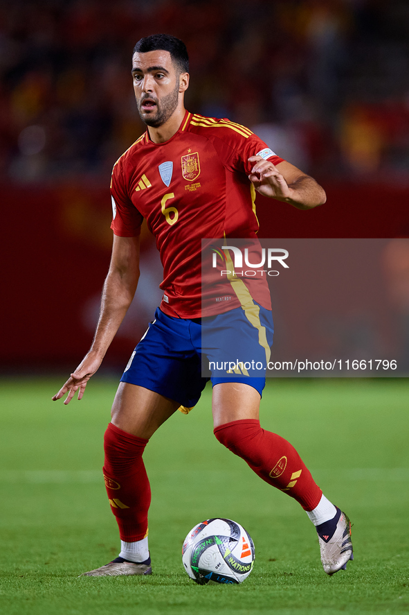 Mikel Merino of Spain is in action during the UEFA Nations League 2024/25 League A Group A4 game between Spain and Denmark at Enrique Roca S...