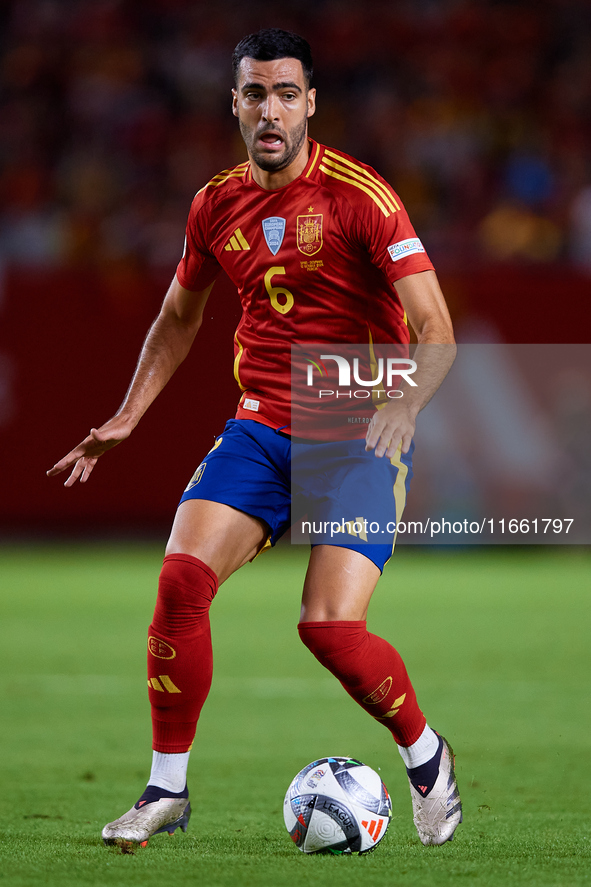 Mikel Merino of Spain is in action during the UEFA Nations League 2024/25 League A Group A4 game between Spain and Denmark at Enrique Roca S...