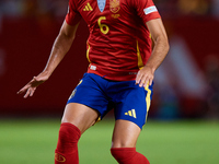 Mikel Merino of Spain is in action during the UEFA Nations League 2024/25 League A Group A4 game between Spain and Denmark at Enrique Roca S...