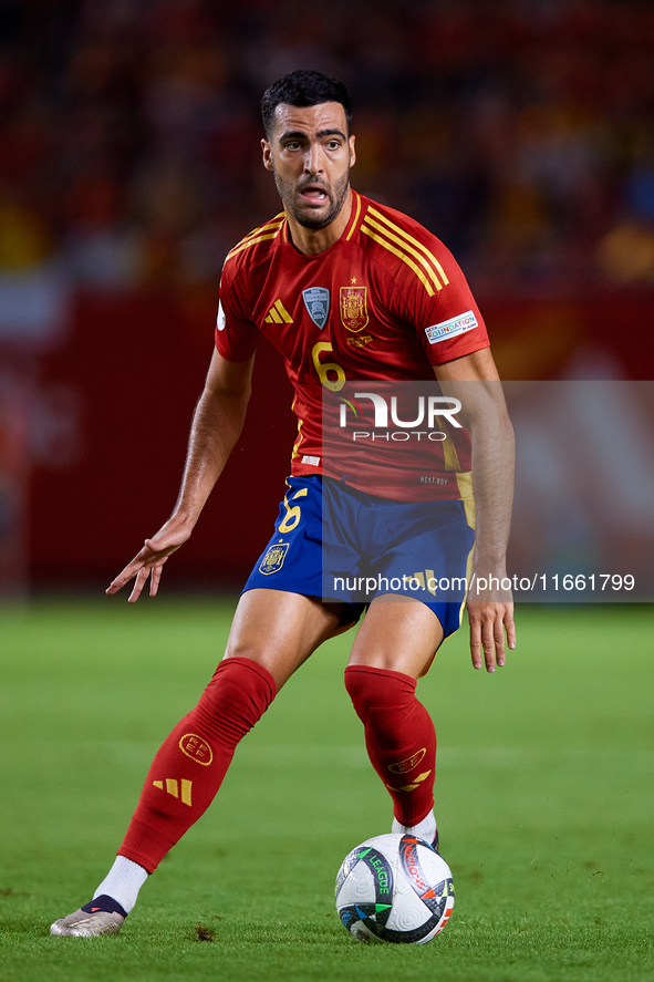 Mikel Merino of Spain is in action during the UEFA Nations League 2024/25 League A Group A4 game between Spain and Denmark at Enrique Roca S...