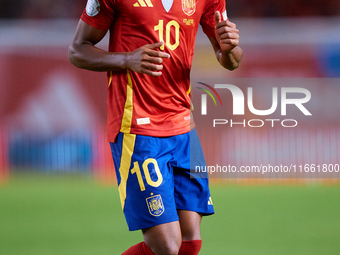 Lamine Yamal of Spain looks on during the UEFA Nations League 2024/25 League A Group A4 game between Spain and Denmark at Enrique Roca Stadi...