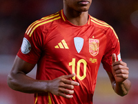 Lamine Yamal of Spain looks on during the UEFA Nations League 2024/25 League A Group A4 game between Spain and Denmark at Enrique Roca Stadi...