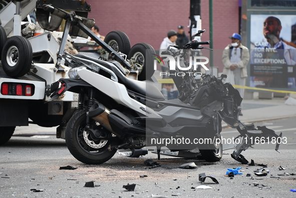 Two people die while riding a motorcycle and crashing into another vehicle in Manhattan, New York, United States, on October 13, 2024. On Su...