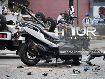 Two people die while riding a motorcycle and crashing into another vehicle in Manhattan, New York, United States, on October 13, 2024. On Su...