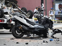 Two people die while riding a motorcycle and crashing into another vehicle in Manhattan, New York, United States, on October 13, 2024. On Su...