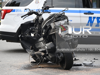 Two people die while riding a motorcycle and crashing into another vehicle in Manhattan, New York, United States, on October 13, 2024. On Su...