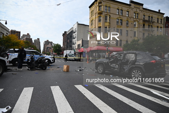 Two people die while riding a motorcycle and crashing into another vehicle in Manhattan, New York, United States, on October 13, 2024. On Su...