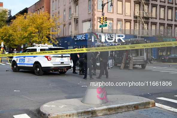 Two people die while riding a motorcycle and crashing into another vehicle in Manhattan, New York, United States, on October 13, 2024. On Su...