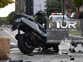 Two people die while riding a motorcycle and crashing into another vehicle in Manhattan, New York, United States, on October 13, 2024. On Su...