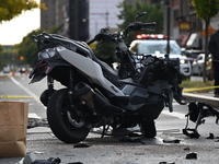 Two people die while riding a motorcycle and crashing into another vehicle in Manhattan, New York, United States, on October 13, 2024. On Su...