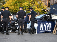 Two people die while riding a motorcycle and crashing into another vehicle in Manhattan, New York, United States, on October 13, 2024. On Su...