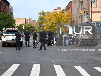 Two people die while riding a motorcycle and crashing into another vehicle in Manhattan, New York, United States, on October 13, 2024. On Su...