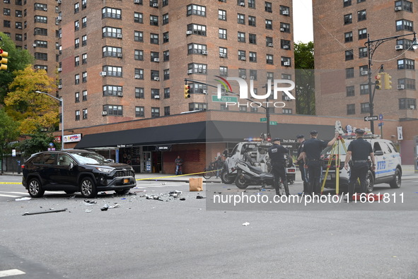 Two people die while riding a motorcycle and crashing into another vehicle in Manhattan, New York, United States, on October 13, 2024. On Su...