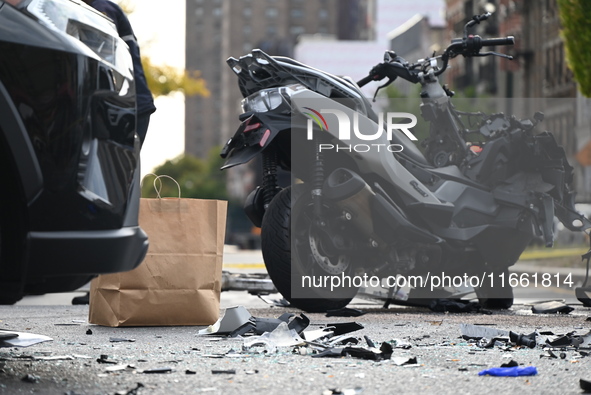 Two people die while riding a motorcycle and crashing into another vehicle in Manhattan, New York, United States, on October 13, 2024. On Su...