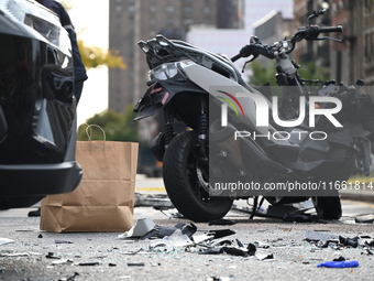 Two people die while riding a motorcycle and crashing into another vehicle in Manhattan, New York, United States, on October 13, 2024. On Su...