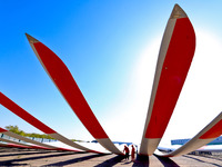 Technicians carry out strict testing of wind turbine blades before they leave the factory in the storage field of the wind turbine blade pro...