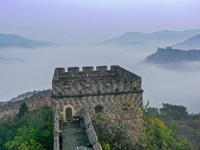 A misty morning mist hangs over the Jinshanling Great Wall in Chengde, China, on October 13, 2024. (