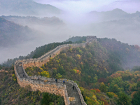 A misty morning mist hangs over the Jinshanling Great Wall in Chengde, China, on October 13, 2024. (