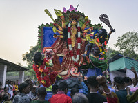 Hindu devotees carry an idol of the goddess 'Durga' during the final day (Vijaya Dashami) of the Durga Puja festival in Sylhet, Bangladesh,...