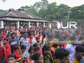 Bangladeshi Hindu devotees join a rally to immerse an idol of their deity 'Durga' during the final day (Vijaya Dashami) of the Durga Puja fe...