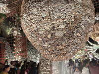 Devotees visit the Puja Pandal during the Dushhera-Vijaya Dashami festival on the final day of Durga Puja in Siliguri, India, on October 13,...