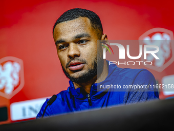 Netherlands forward Cody Gakpo speaks during the press conference in Munich, Germany, on October 13, 2024, at the Allianz Arena for the UEFA...