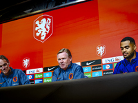 Netherlands trainer Ronald Koeman and Netherlands forward Cody Gakpo attend the press conference at the Allianz Arena for the UEFA Nations L...