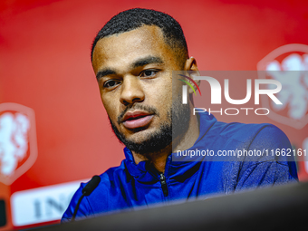 Netherlands forward Cody Gakpo speaks during the press conference in Munich, Germany, on October 13, 2024, at the Allianz Arena for the UEFA...