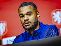 Netherlands forward Cody Gakpo speaks during the press conference in Munich, Germany, on October 13, 2024, at the Allianz Arena for the UEFA...