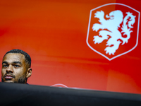 Netherlands forward Cody Gakpo speaks during the press conference in Munich, Germany, on October 13, 2024, at the Allianz Arena for the UEFA...