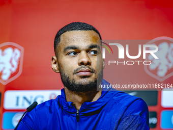 Netherlands forward Cody Gakpo speaks during the press conference in Munich, Germany, on October 13, 2024, at the Allianz Arena for the UEFA...