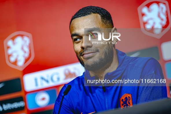 Netherlands forward Cody Gakpo speaks during the press conference in Munich, Germany, on October 13, 2024, at the Allianz Arena for the UEFA...