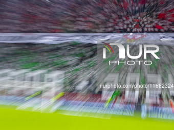 Hungarian fans and tricolor flags are present during the national anthem before the UEFA Nations League Group match at Puskas Arena in Budap...